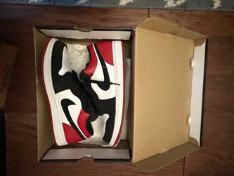 Jordan 1 low black toe