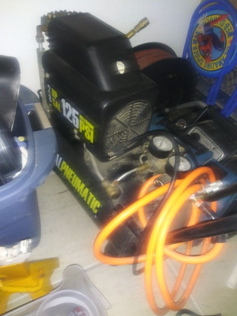 Air compressor and 50 ft brand new hose reel need gone today