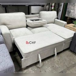 Reversible Sleeper Sectional with Storage Chaise, Drop-Down Table, Cup Holders and Charging Ports