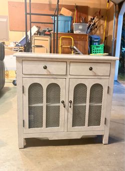 Distressed white accent cabinet w/ wire mesh doors