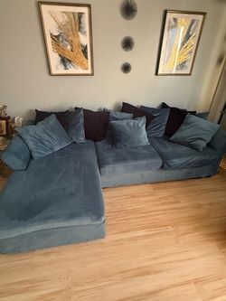 Suede sectional with side tables