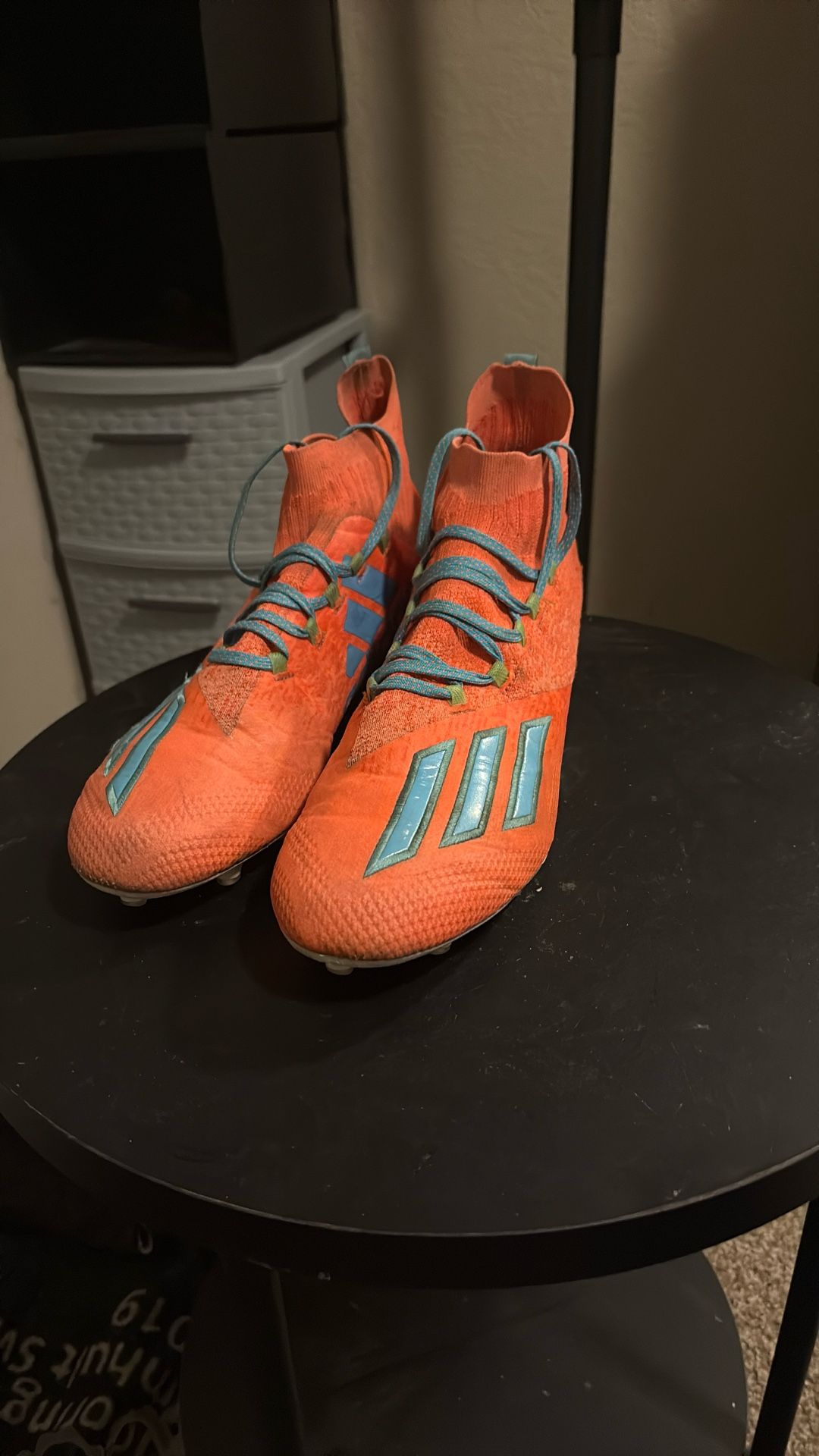 orange adidas football cleats