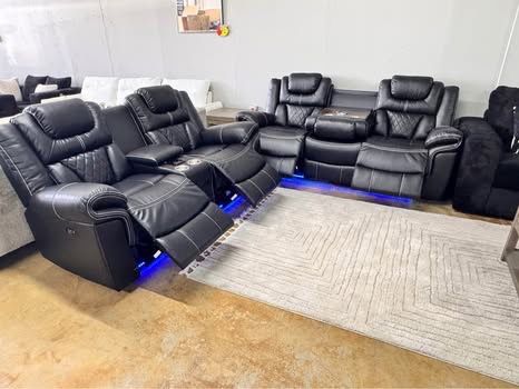 Power motion, LED lights and speaker on loveseat console. Sofa with LED lights and drop down tray and wireless charger, extra for delivery take your f