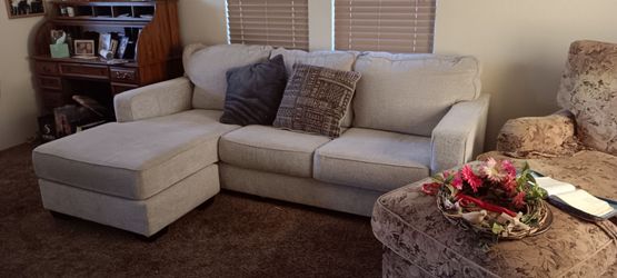 Sectional couch bought new at living Spaces it almost new ,