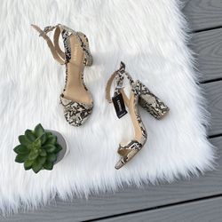 Snakeprint open toe heels