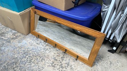 Mirror with hooks