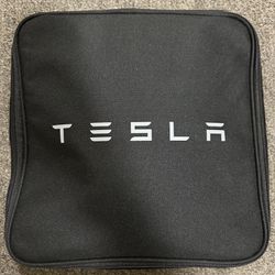 Tesla.  Charger Plus Adapter 