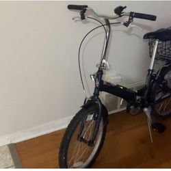 A Unisex Folding Bike You Can Add Parts And Make It Electrical Or Ride Of Gas 