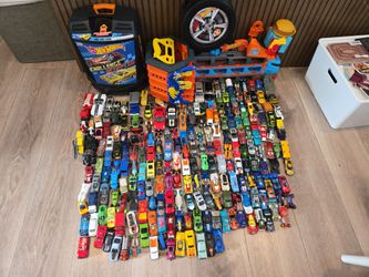 200 cars and hotwheels with tracks and storage