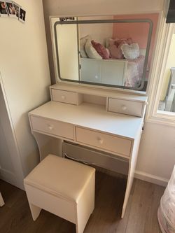 White vanity with lights