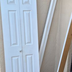 Small bi-fold door with frame