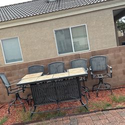 A High Table with 5 Chairs with Cushions for Patio
