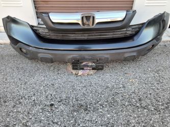 2007-2009 Honda CR-V front bumper with Grill and fog lights with accessories OEM.