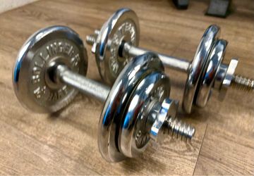 Adjustable Spin-lock Cast Iron  Chromed Dumbbells w/ pairs of 5s a d 3s pounders. Total:42 lbs