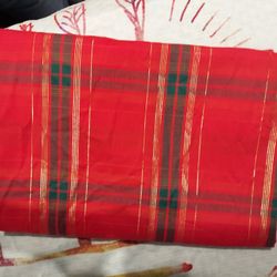 10 red and gold place mats, with matching table cloth $15.00