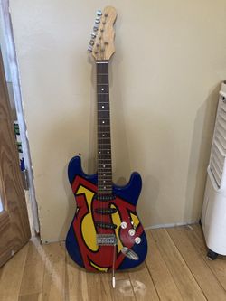 COLLECTIBLE SUPER MAN GUITAR