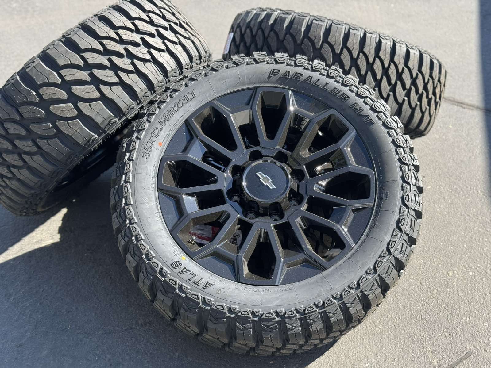 22" Black Wheels 22x9 8x180 Rims and 35” Tires 3500 Chevy 2500 Silverado Chevrolet GMC Sierra Denali HD 2500HD 3500HD AT4 Ultimate