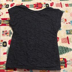 Black lace blouse. (teens) 