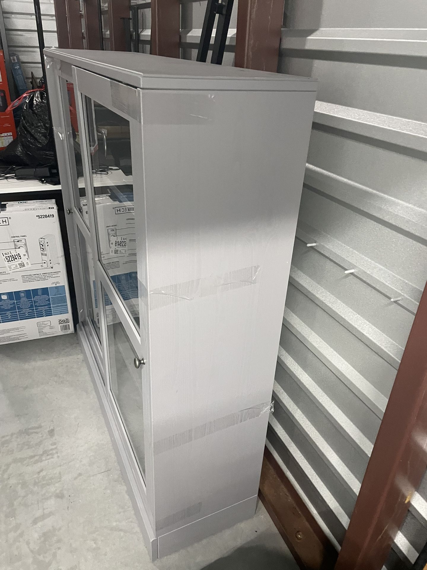 Metal and glass display cabinet