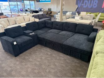 Large black storage sleeper sectional