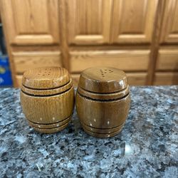 Vintage Wood Barrel Pair of Salt and Pepper Shakers. Size approximately 2 1/4 inches tall. Preowned never used.