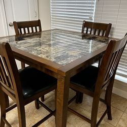 Like new 4 Seater Wood Dining Table and 4 Chairs