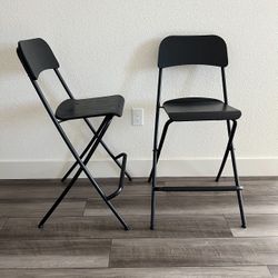 A Set Of 4 Bar Stools