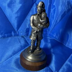 Vintage 1987 Firefighter Holding Child Figurine Pewter Style Statue Wood Base