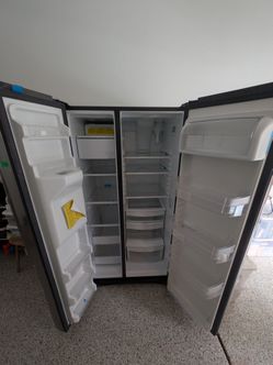 GE - 25.1 cu. ft. Side by Side Refrigerator in Fingerprint Resistant Stainless Steel
