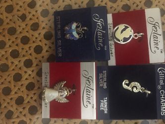 4 sterling silver charms need cleaning