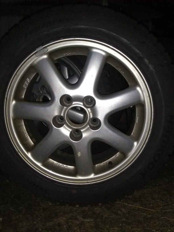 4 Hankook Studded Snow Tires 205/55/R16 on Saab 5x100 alloy rims