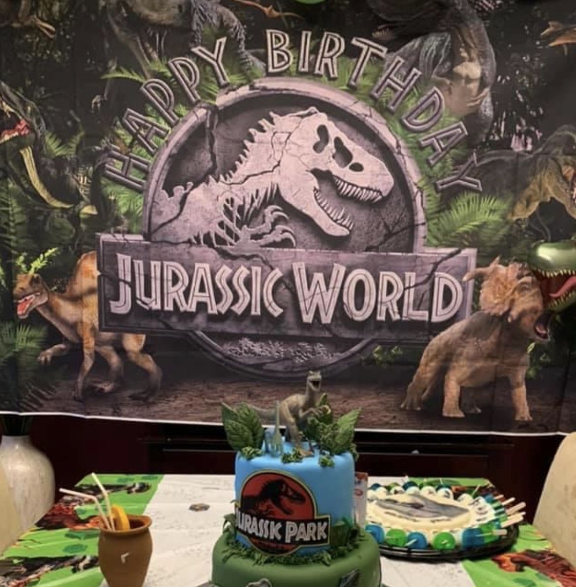 Jurassic World Birthday Banner With Set Of Green Leaves.