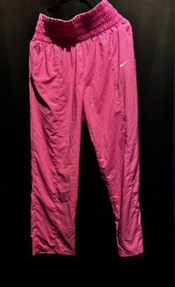 Large Nike pink track pants with drawstring waist and pockets. Size L