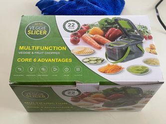 Multi purpose vegetable slicer / mandolin