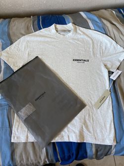 Essential fear of god shirt size xtra small
