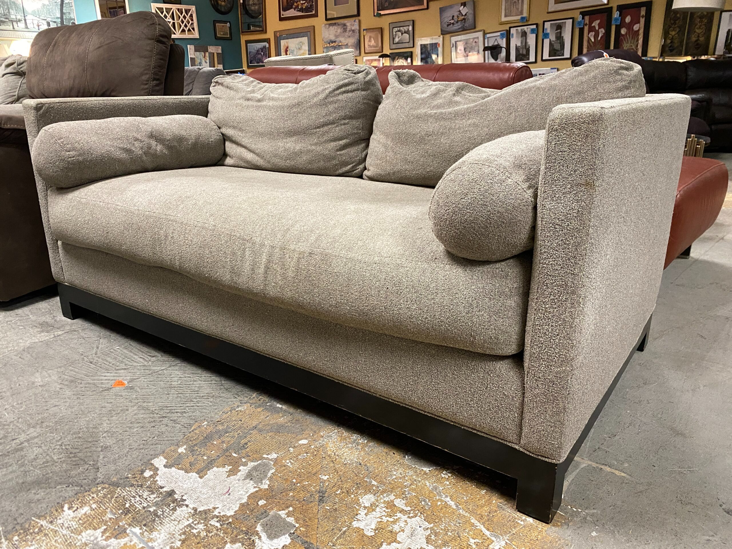 CISCO BROTHERS Beige Upholstered Loveseat w/ Black Wood Base