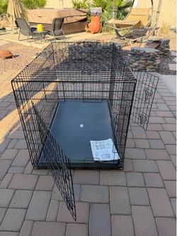 Brand new XL dog crate! 48”x29x32. 2 doors. Comes with divider.