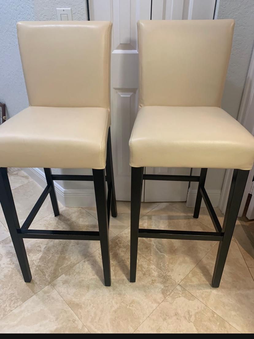 Two Crate And barrel Leather Bar Stools