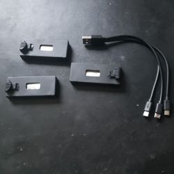 THREE BRAND NEW DRONE BATTERIES AND CHARGER CABLE