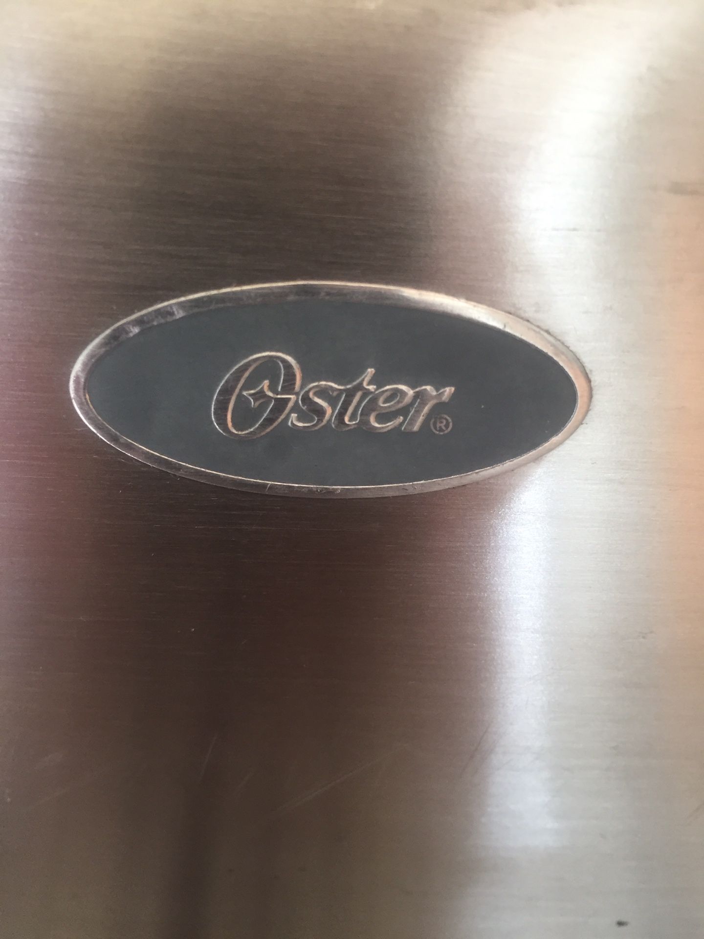 Oster Stainless Steel Silver 4 slot Toaster 7.3 in. H x 6.9 in. W x 16 in. D