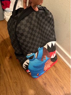 Spray ground backpack