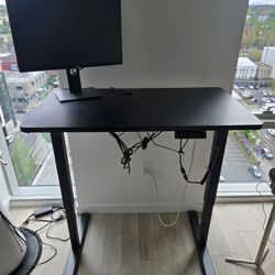 WFH Power Bundle – Standing Desk, 27” Dell Monitor, Docking Station, Webcam + Keyboard (Negotiable)
