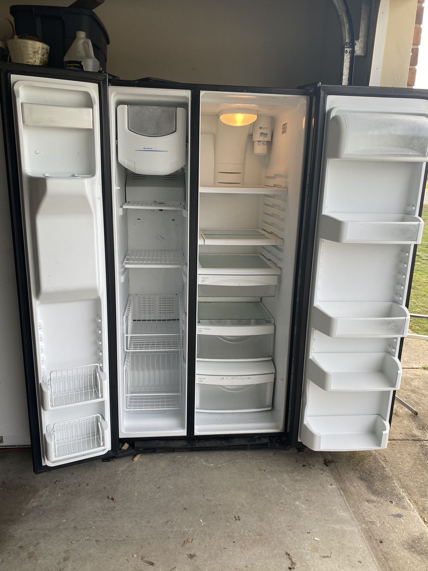 GE Refrigerator Black Side By Side Left To Right 3ft Top To Bottom 69in Front To Back 32in
