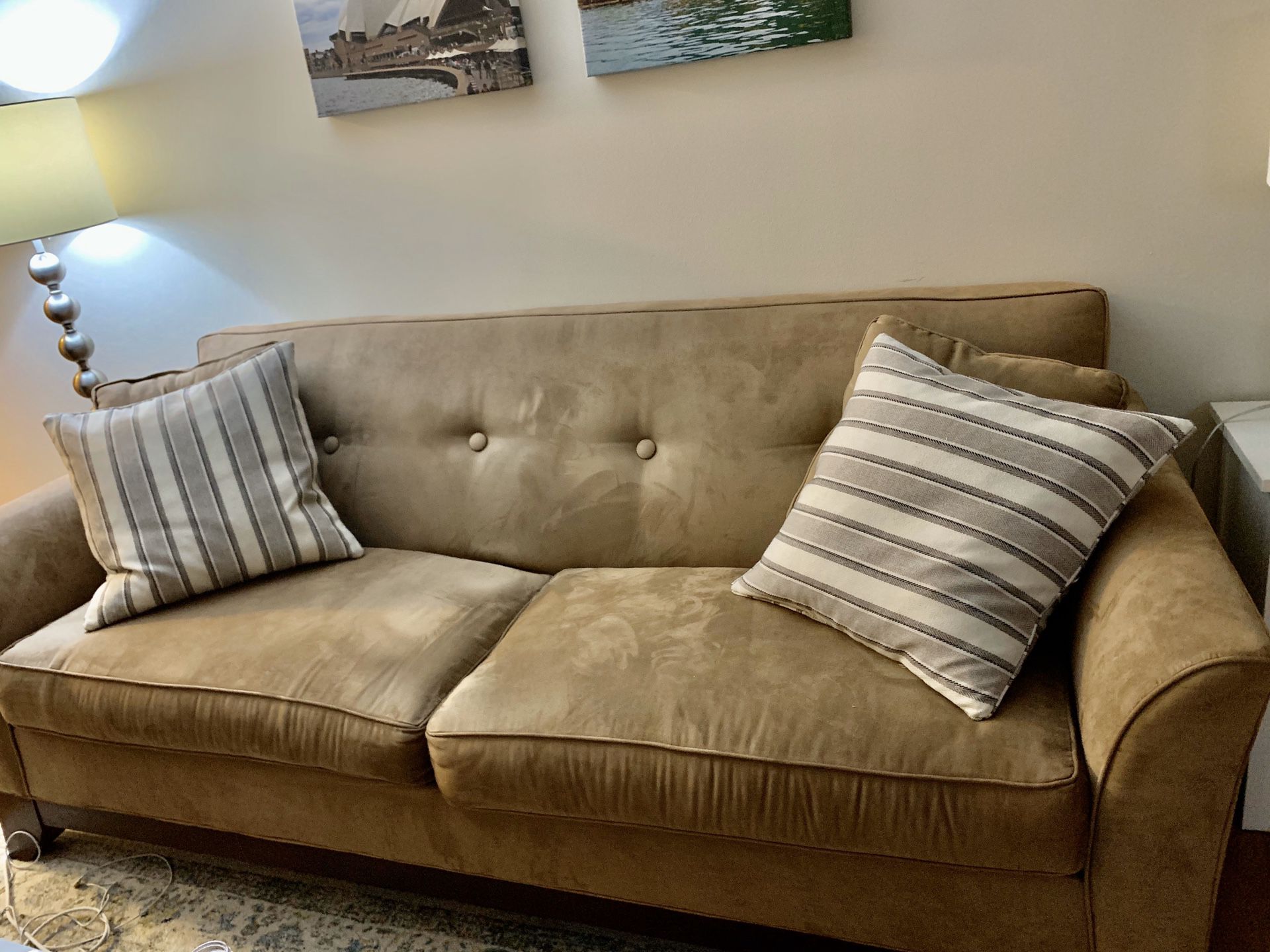 Suede brown couch and pillows