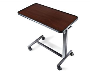 Adjustable bed side table