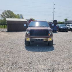 Raxiom Projector Headlights with LED Accent; Black Housing; Clear Lens (09-14 F-150 w/ Factory Halogen Headlights)