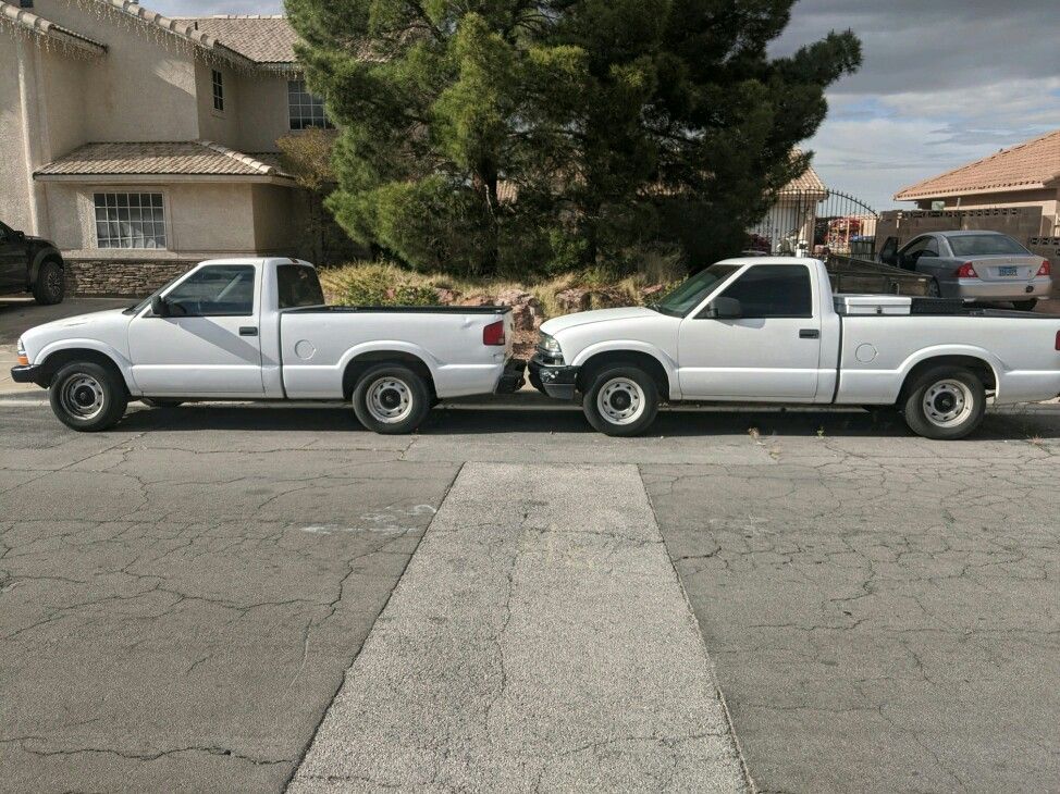 Package deal of 2 - 2003 Chevy S10s 5-speed short bed trucks.