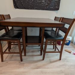 High Wooden Table with Chairs