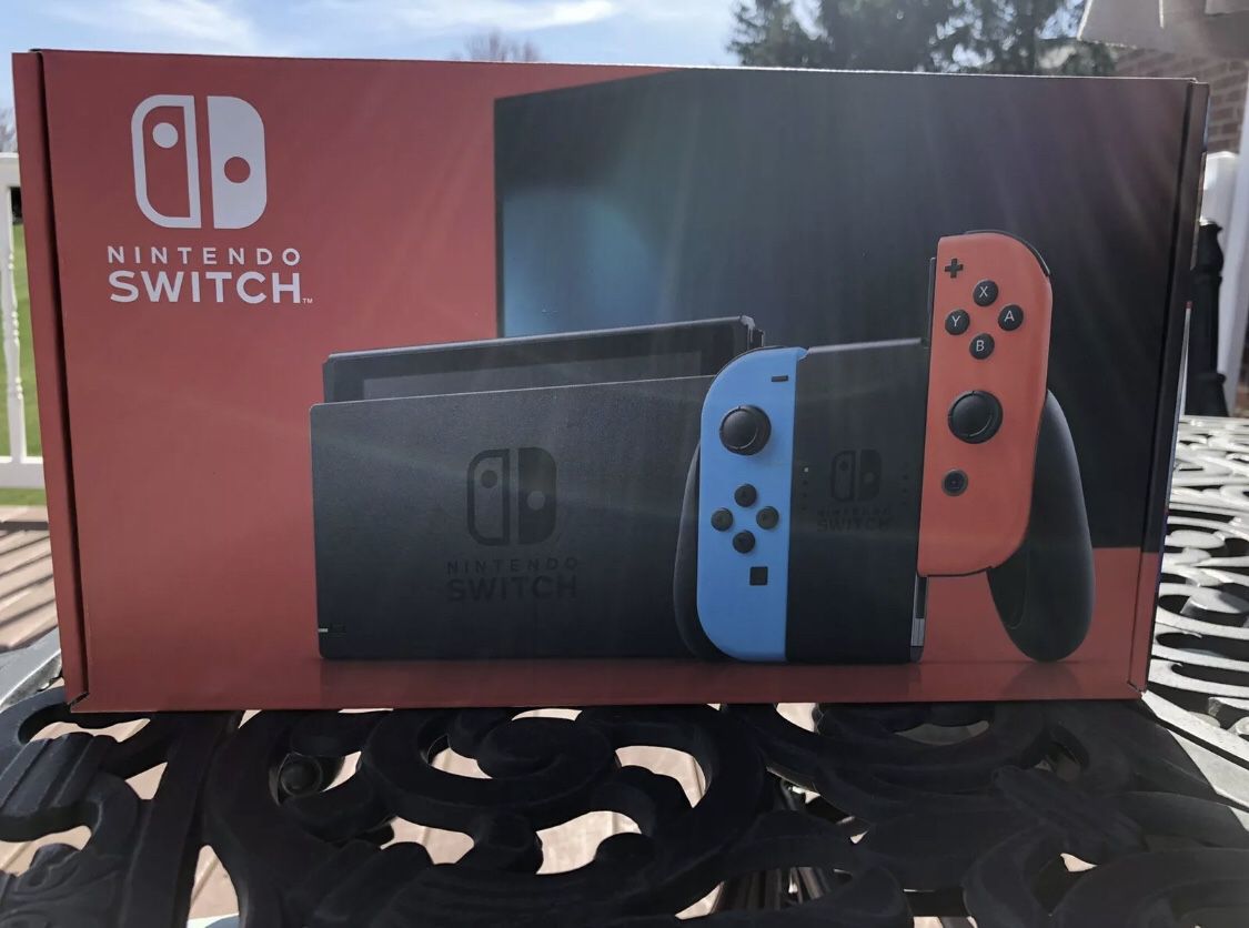 NEW Nintendo Switch Console Blue & Red Joy Con UNOPENED IN HAND
