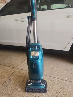 KENMORE, NO TOUCH INTUITION VACUUM.